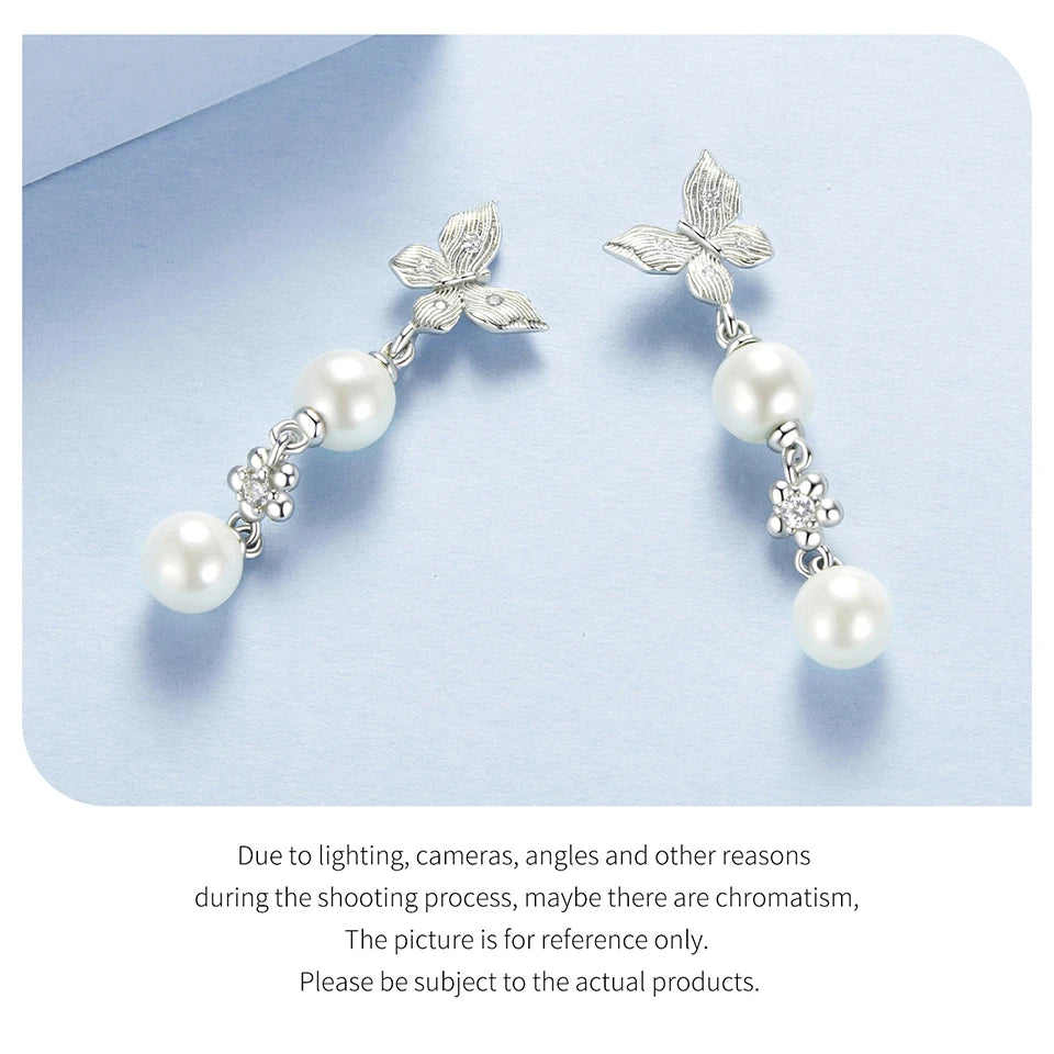 JEW014ER     Solid 925 Sterling Silver Elegant Pearl Butterfly Stud - Klixstore